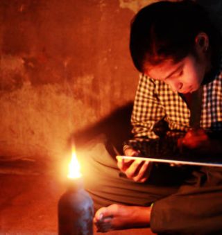 Woman Holding a Candle of Hope